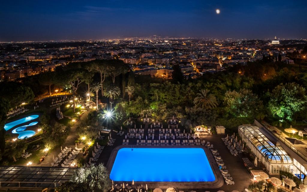 Night time view over Rome from hotel terrace low